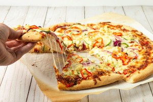 Pizza vegetariana, representando los tipos de comida vegetariana.